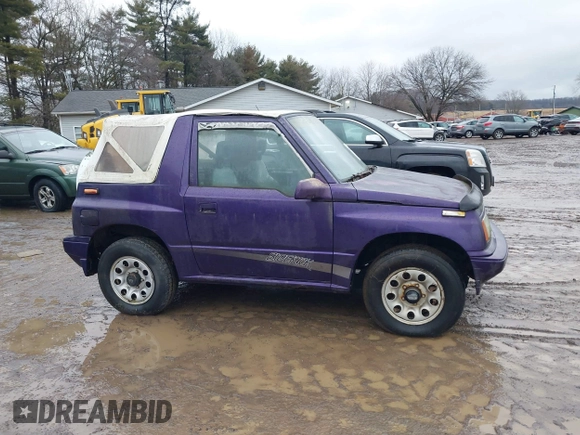 1993 Suzuki Sidekick z VIN 2S3TA01C4P6406238, wystawiony jako IAAI lot #41469419 z przebiegiem 126 667 mil mil oraz . Historia ofert i sprzedaży dostępna na DreamBid. Obrazek 13.