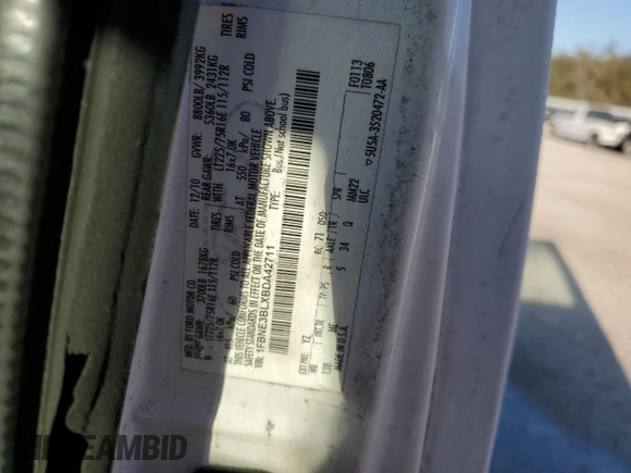 2011 Ford Econoline Passenger XL with VIN 1FBNE3BLXBDA42711, listed as a Copart auction lot 44326425 with 476,137 mi miles and Salvage Title. Bid and sale history available at carsss.com. Image 13.