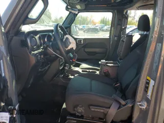 2022 Jeep Wrangler Unlimited High Tide with VIN 1C4HJXDGXNW142263, listed as a Copart auction lot 72552824 with 43,321 mi miles and Salvage Title. Bid and sale history available at DreamBid. Image 7.