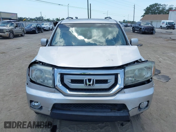 2011 Honda Pilot EX-L with VIN 5FNYF4H54BB099550, listed as a IAAI auction lot 42107327 with 217,050 mi miles and . Bid and sale history available at carsss.com. Image 12.