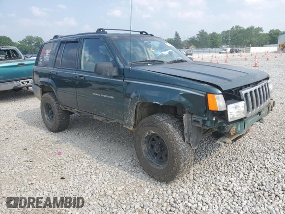 1997 Jeep Grand Cherokee Laredo with VIN 1J4GZ58SXVC595012, listed as a Copart auction lot 59746655 with Not provided miles and Salvage title. Bid and sale history available at DreamBid. Image 4.