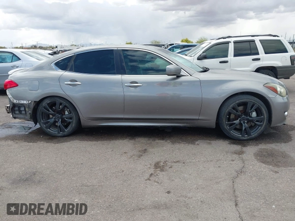 2012 Infiniti M with VIN JN1BY1AP3CM332453, listed as a IAAI auction lot 41944895 with 176,989 mi miles and . Bid and sale history available at DreamBid. Image 14.
