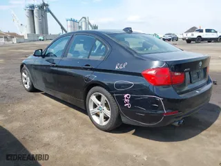 2014 BMW 3 Series 328i xDrive with VIN WBA3B5G58ENS08110, listed as a IAAI auction lot 41890299 with 90,316 mi miles. Bid and sale history available at carsss.com. Image 3.