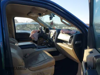 2015 Ford F-150 XLT with VIN 1FTEW1EP7FFD00589, listed as a IAAI auction lot 41677203 with 156,064 mi miles. Bid and sale history available at carsss.com. Image 5.