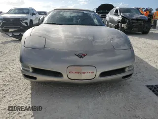 2000 Chevrolet Corvette with VIN 1G1YY32GXY5124274, listed as a Copart auction lot 77097974 with 0 mi miles and Salvage Title. Bid and sale history available at carsss.com. Image 5.