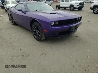2019 Dodge Challenger SXT z VIN 2C3CDZAGXKH716960, wystawiony jako Copart lot #57473655 z przebiegiem 64 293 mil mil oraz Szkoda całkowita • Salvage title. Historia ofert i sprzedaży dostępna na DreamBid. Obrazek 14.