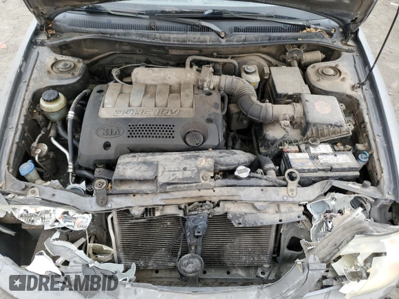 2003 Kia Spectra with VIN KNAFB121935265035, listed as a Copart auction lot 86407934 with 201,586 mi miles and Salvage Title. Bid and sale history available at DreamBid. Image 12.