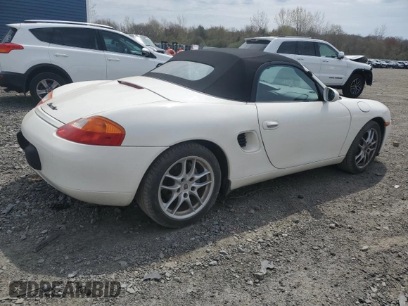 2000 Porsche Boxster z VIN WP0CA2983YU620313, wystawiony jako Copart lot #54605995 z przebiegiem 134 807 mil mil oraz Tytuł czysty. Historia ofert i sprzedaży dostępna na DreamBid. Obrazek 3.