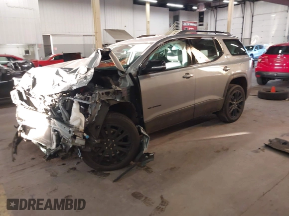 2023 GMC Acadia SLT with VIN 1GKKNULS7PZ133802, listed as a IAAI auction lot 41266532 with 22,214 mi miles and . Bid and sale history available at DreamBid. Image 2.