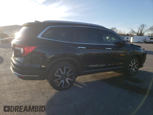2021 Honda Pilot Touring 8-Passenger with VIN 5FNYF5H94MB039974, listed as a Copart auction lot 82654964 with 54,048 mi miles and Salvage Title. Bid and sale history available at DreamBid. Image 3.