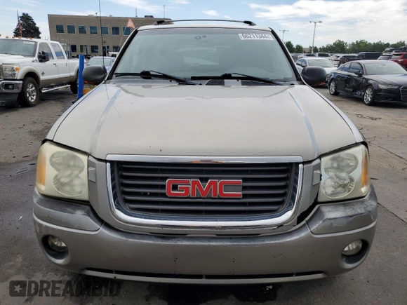 2003 GMC Envoy SLT with VIN 1GKDT13SX32281667, listed as a Copart auction lot 66211344 with 228,312 mi miles and Clean Title. Bid and sale history available at carsss.com. Image 5.