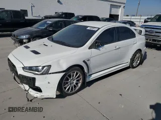 2015 Mitsubishi Lancer Evolution GSR with VIN JA32W8FV4FU024603, listed as a Copart auction lot 74699914 with 81,311 mi miles and Salvage Title. Bid and sale history available at carsss.com. Image 1.