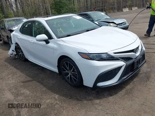 2023 Toyota Camry SE with VIN 4T1G11AK7PU771765, listed as a IAAI auction lot 42060929 with 39,407 mi miles and . Bid and sale history available at DreamBid. Image 1.