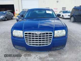 2009 Chrysler 300 LX with VIN 2C3KA43D69H614978, listed as a IAAI auction lot 41966879 with 247,871 mi miles. Bid and sale history available at carsss.com. Image 6.