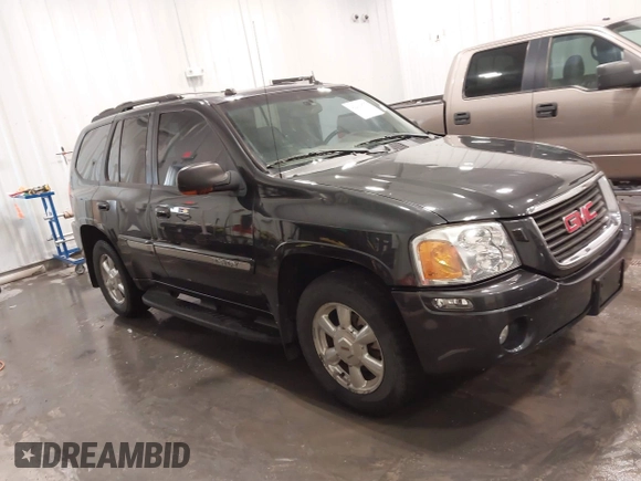 2005 GMC Envoy SLT z VIN 1GKDT13S852281122, wystawiony jako IAAI lot #42292577 z przebiegiem 156 052 mil mil oraz . Historia ofert i sprzedaży dostępna na DreamBid. Obrazek 1.