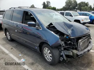 2009 Honda Odyssey EX-L with VIN 5FNRL38729B413361, listed as a Copart auction lot 62954844 with 166,242 mi miles and Salvage Title. Bid and sale history available at carsss.com. Image 4.