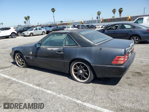 1992 Mercedes-Benz 500 z VIN WDBFA66E9NF050217, wystawiony jako Copart lot #58065965 z przebiegiem 143 456 mil mil oraz Tytuł czysty. Historia ofert i sprzedaży dostępna na DreamBid. Obrazek 2.