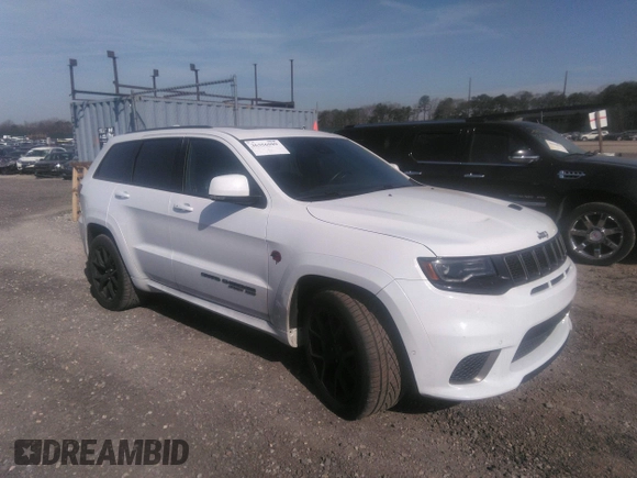 2020 Jeep Grand Cherokee Trackhawk z VIN 1C4RJFN94LC117596, wystawiony jako IAAI lot #36356989 z przebiegiem 37 994 mil mil oraz . Historia ofert i sprzedaży dostępna na DreamBid. Obrazek 12.