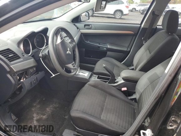 2012 Mitsubishi Lancer SE with VIN JA32V2FW8CU006609, listed as a Copart auction lot 56335965 with 128,218 mi miles and Salvage title. Bid and sale history available at DreamBid. Image 7.