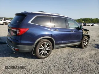 2019 Honda Pilot Touring 8-Passenger z VIN 5FNYF6H90KB000303, wystawiony jako Copart lot #52410585 z przebiegiem 129 190 mil mil oraz Szkoda całkowita • Salvage title. Historia ofert i sprzedaży dostępna na DreamBid. Obrazek 3.