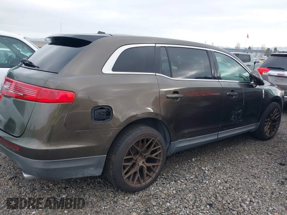 2011 Lincoln MKT with VIN 2LMHJ5AR8BBJ54371, listed as a IAAI auction lot 41147331 with 111,347 mi miles and . Bid and sale history available at DreamBid. Image 13.