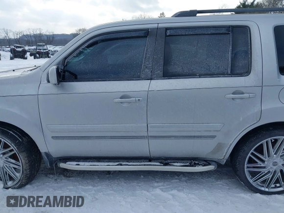 2011 Honda Pilot EX-L with VIN 5FNYF3H6XBB041672, listed as a IAAI auction lot 41337038 with 205,741 mi miles and . Bid and sale history available at DreamBid. Image 15.