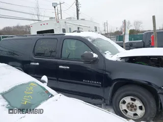 2010 Chevrolet Suburban LS with VIN 1GNUKHE37AR203811, listed as a IAAI auction lot 41304431 with Not provided miles and . Bid and sale history available at DreamBid. Image 12.