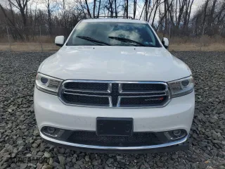 2014 Dodge Durango Limited with VIN 1C4RDJDG2EC287002, listed as a Copart auction lot 50779135 with 211,323 mi miles and Clean Title. Bid and sale history available at carsss.com. Image 5.