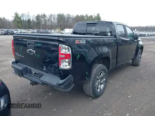 2019 Chevrolet Colorado 4WD Z71 z VIN 1GCGTDEN6K1181460, wystawiony jako IAAI lot #41815027 z przebiegiem 103 283 mil mil oraz . Historia ofert i sprzedaży dostępna na DreamBid. Obrazek 6.