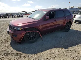 2020 Jeep Grand Cherokee Laredo E with VIN 1C4RJEAG2LC379633, listed as a Copart auction lot 58437555 with 57,219 mi miles and Salvage title. Bid and sale history available at DreamBid. Image 1.