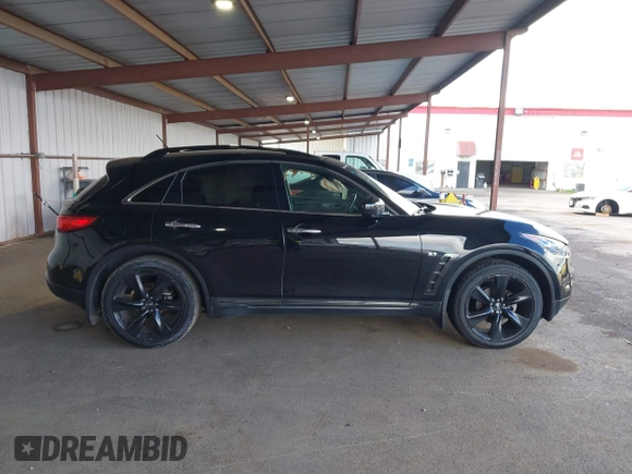 2016 Infiniti QX70 z VIN JN8CS1MW2GM752589, wystawiony jako IAAI lot #41826357 z przebiegiem 142 469 mil mil oraz . Historia ofert i sprzedaży dostępna na DreamBid. Obrazek 13.