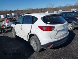2016 Mazda CX-5 Touring with VIN JM3KE4CYXG0917841, listed as a IAAI auction lot 41420641 with 75,710 mi miles. Bid and sale history available at carsss.com. Image 3.