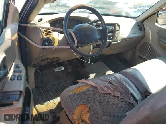 2000 Ford F-150 XL with VIN 1FTRX18L7YKA42575, listed as a Copart auction lot 73034804 with 263,959 mi miles and Non repairable. Bid and sale history available at DreamBid. Image 8.