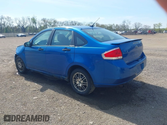 2010 Ford Focus SE with VIN 1FAHP3FNXAW159048, listed as a IAAI auction lot 42103062 with 142,810 mi miles. Bid and sale history available at carsss.com. Image 3.