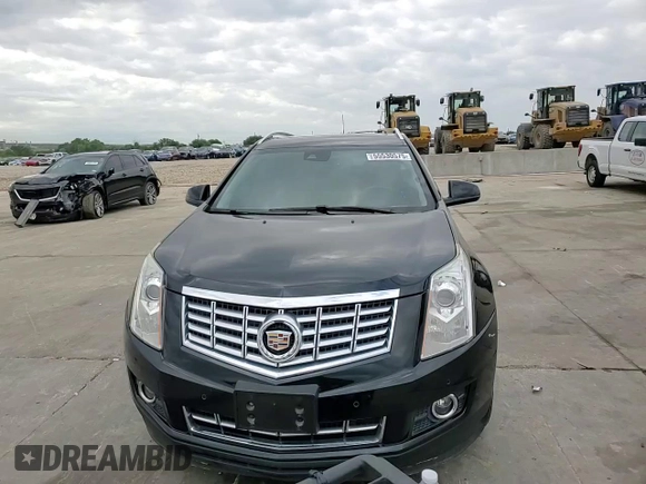 2015 Cadillac SRX Premium Collection z VIN 3GYFNDE33FS574125, wystawiony jako Copart lot #55530575 z przebiegiem 76 956 mil mil oraz Szkoda całkowita • Salvage title. Historia ofert i sprzedaży dostępna na DreamBid. Obrazek 14.
