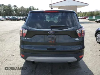 2017 Ford Escape SE with VIN 1FMCU9GD6HUD14508, listed as a Copart auction lot 49112575 with 77,668 mi miles and Salvage Title. Bid and sale history available at DreamBid. Image 6.
