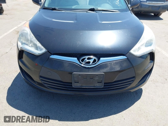 2013 Hyundai Veloster w/Black Int with VIN KMHTC6AD2DU144376, listed as a IAAI auction lot 42720882 with 143,023 mi miles and . Bid and sale history available at DreamBid. Image 6.