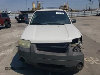 2006 Ford Escape XLS with VIN 1FMCU02Z36KA71926, listed as a Copart auction lot 57697364 with 225,212 mi miles and Salvage title. Bid and sale history available at DreamBid. Image 5.