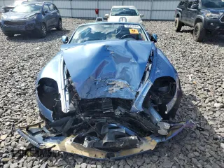 2006 Aston Martin DB9 z VIN SCFAB02A26GB04627, wystawiony jako Copart lot #68314504 z przebiegiem Nie podano mil oraz Szkody całkowita. Historia ofert i sprzedaży dostępna na DreamBid. Obrazek 5.