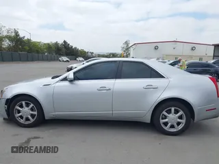 2009 Cadillac CTS RWD с VIN 1G6DF577690160058, выставлен на аукционе IAAI как лот 42108078 с пробегом 114 381 миль миль и . История ставок и продаж доступна на DreamBid. Изображение 14.