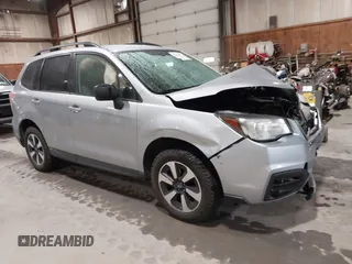 2017 Subaru Forester z VIN JF2SJABC0HH440186, wystawiony jako IAAI lot #42315361 z przebiegiem 89 293 mil mil oraz . Historia ofert i sprzedaży dostępna na DreamBid. Obrazek 1.