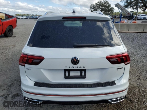 2023 Volkswagen Tiguan SEL R-Line z VIN 3VV4B7AX8PM040917, wystawiony jako Copart lot #84402084 z przebiegiem 6 905 mil mil oraz Szkoda całkowita • Salvage title. Historia ofert i sprzedaży dostępna na DreamBid. Obrazek 6.