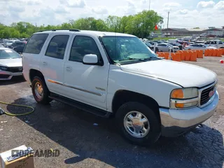 2004 GMC Yukon SLT with VIN 1GKEK13Z94J232083, listed as a IAAI auction lot 42101575 with 310,866 mi miles. Bid and sale history available at carsss.com. Image 1.
