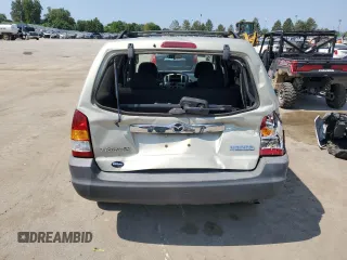 2004 Mazda Tribute DX with VIN 4F2YZ02B74KM13874, listed as a Copart auction lot 65422864 with 288,215 mi miles and Salvage Title. Bid and sale history available at carsss.com. Image 6.