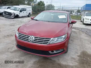 2014 Volkswagen CC Sport with VIN WVWBN7AN0EE527558, listed as a IAAI auction lot 41336204 with 130,005 mi miles and . Bid and sale history available at DreamBid. Image 6.