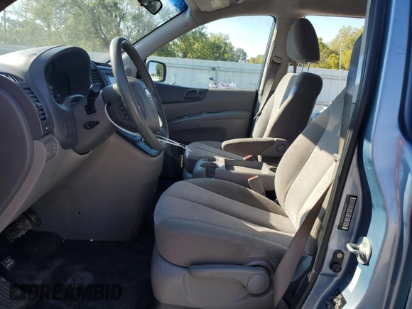 2012 Kia Sedona LX with VIN KNDMG4C70C6447748, listed as a Copart auction lot 71377294 with 146,057 mi miles and Salvage Title. Bid and sale history available at carsss.com. Image 7.