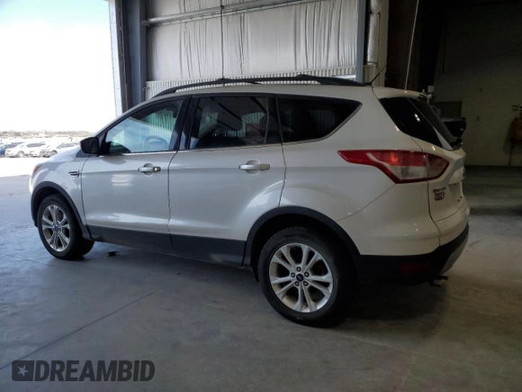 2015 Ford Escape SE with VIN 1FMCU9GX3FUB83917, listed as a Copart auction lot 52743405 with 130,783 mi miles and Clean Title. Bid and sale history available at carsss.com. Image 2.