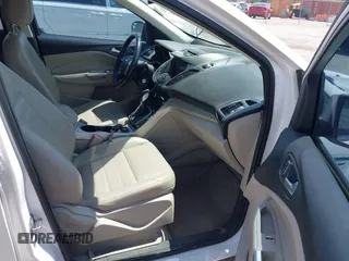 2013 Ford Escape SEL z VIN 1FMCU0H94DUD22476, wystawiony jako IAAI lot #42673808 z przebiegiem 215 811 mil mil oraz . Historia ofert i sprzedaży dostępna na DreamBid. Obrazek 5.
