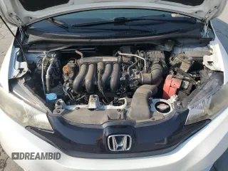 2016 Honda Fit LX с VIN JHMGK5H58GX038954, выставлен на аукционе Copart как лот 63761845 с пробегом 100 628 миль миль и Списание • Salvage title. История ставок и продаж доступна на DreamBid. Изображение 11.