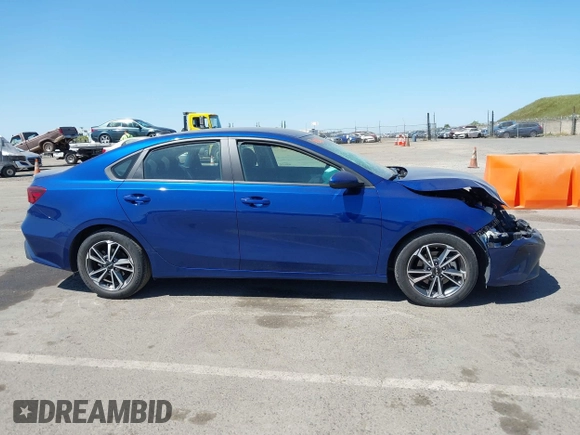 2022 Kia Forte LXS z VIN 3KPF24AD1NE454494, wystawiony jako IAAI lot #42077580 z przebiegiem 53 679 mil mil oraz . Historia ofert i sprzedaży dostępna na DreamBid. Obrazek 13.